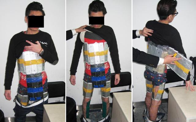 iPhone smuggler caught on the border. Image by HK authorities