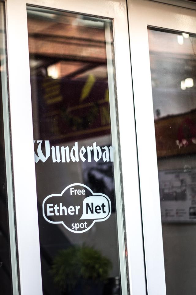 Sticker on bar window indicating the prescense of Ethernetspot on the premises