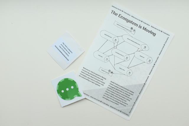 A stack of promotional material for The Ecosystem Is Moving